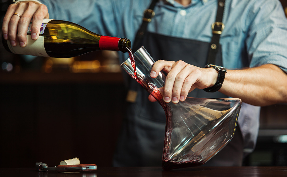 Decanting red wine into a decanter