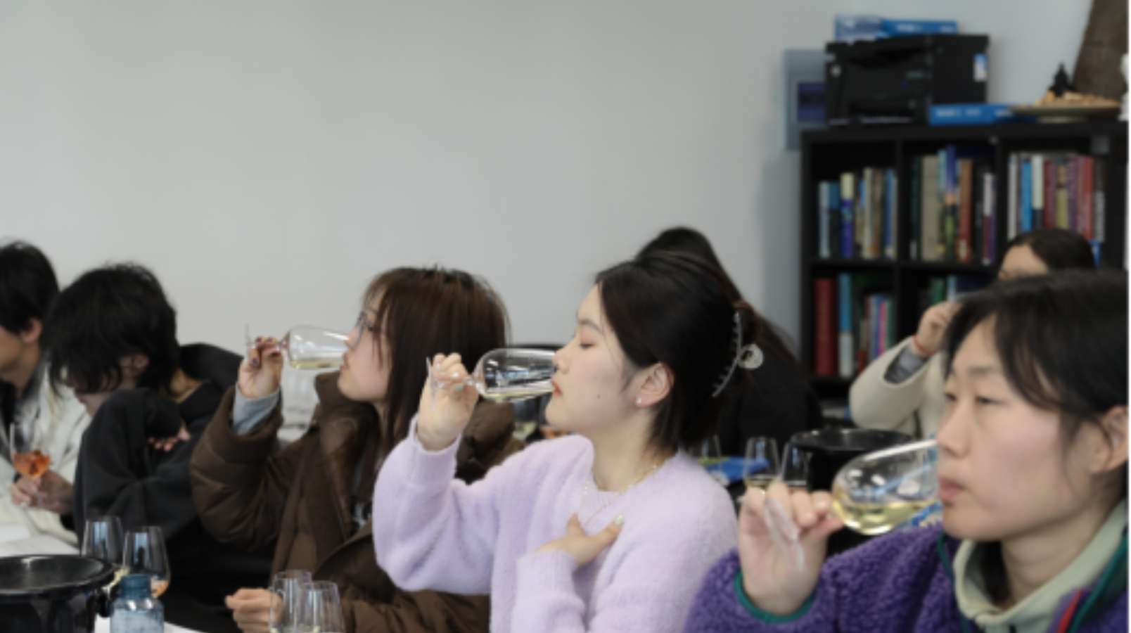 Bursary students tasting wine in Shanghai
