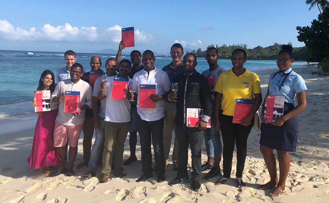 Level 1 Award in Wines class standing on a beach